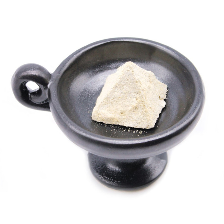 {
  "text": "Incense burner and smudge holder"
}